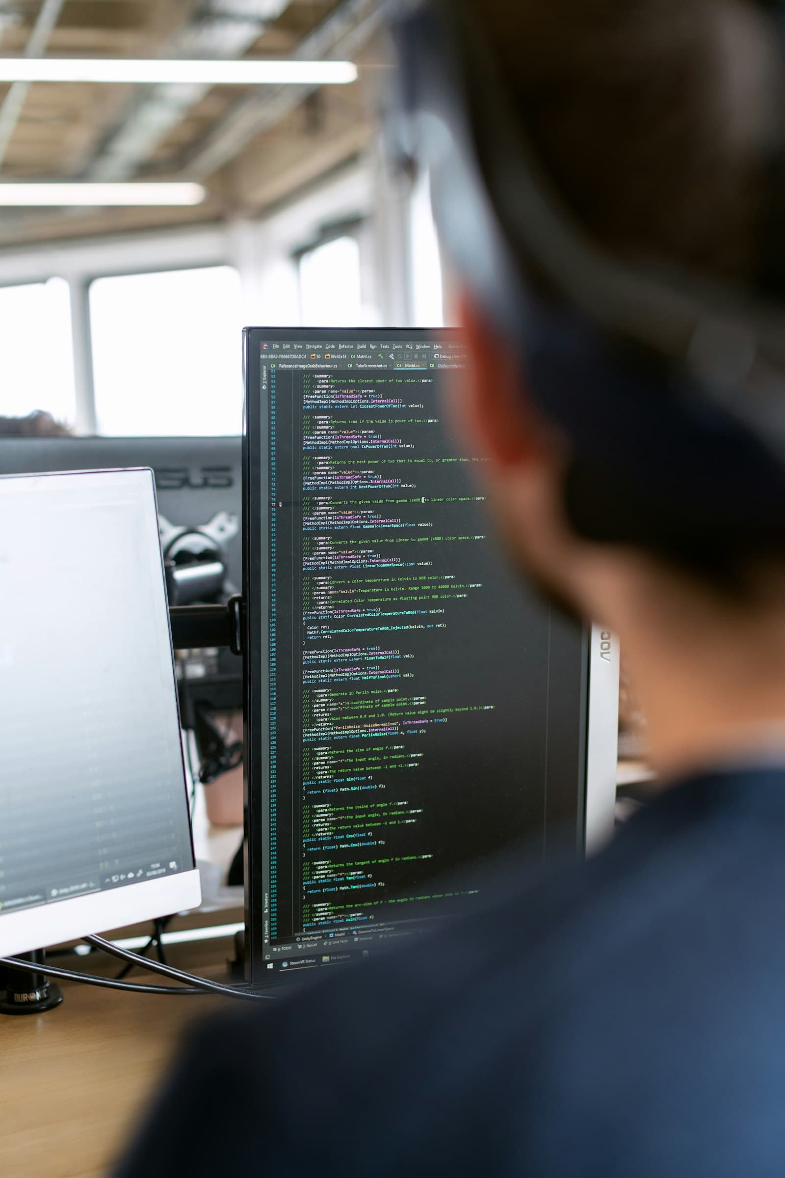 Technical work across two screens